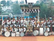 Group Photo of the C.T.I Pipe Band with Shri S.C. Reade, Commandant, C.T.I on the Annual Day Parade Dec 2000 at the C.T.I Parade Ground.